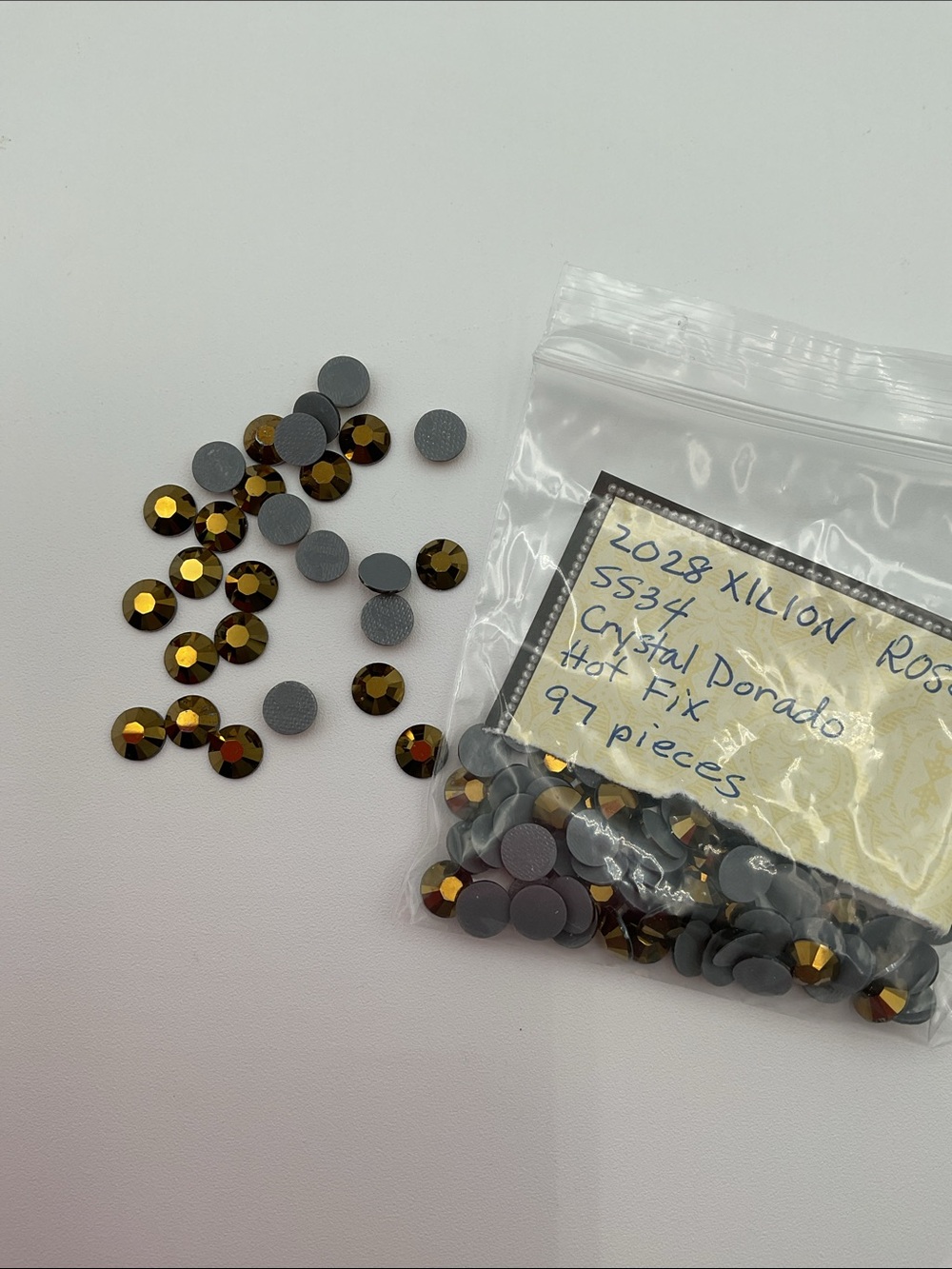 Swarovski • Color: Crystal Dorado, 2028 XILION Rose Hotfix Rhinestones